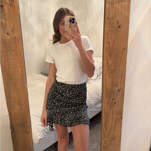 Black and white floral mini skirt size small